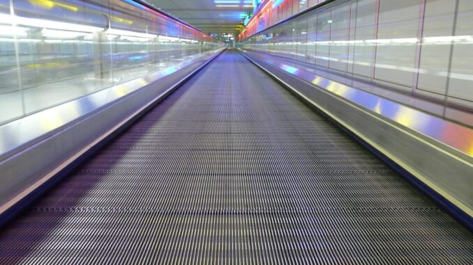 airport walkway woman lost leg